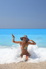 Image showing Pretty blonde woman enjoying the Ionian sea in Greece