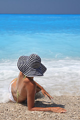 Image showing Pretty blonde woman enjoying the Ionian sea in Greece