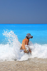 Image showing Pretty blonde woman enjoying the Ionian sea in Greece