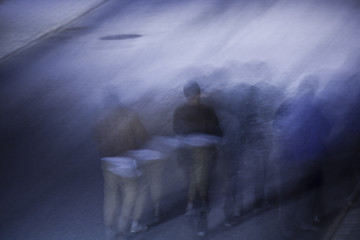 Image showing people walking at night