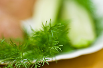 Image showing Potatoes, salt cucumber and dill still-life.  