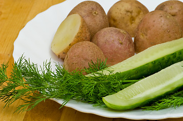Image showing Potatoes, salt cucumber and dill still-life