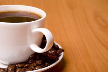 Image showing cup of coffee and beans