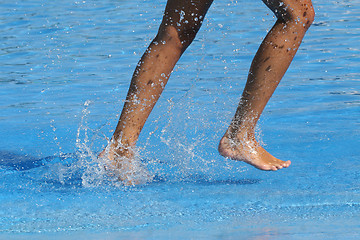 Image showing nice legs in water