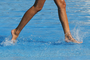 Image showing nice legs in water