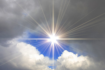 Image showing blue sky with shining sun and clouds