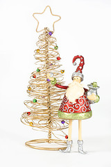 Image showing Golden tree and Santa Elf