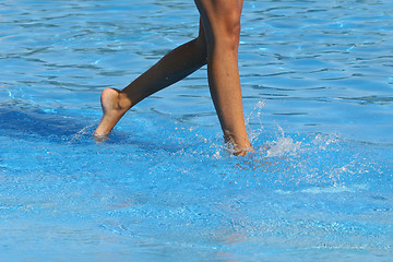 Image showing nice legs in water