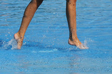 Image showing nice legs in water