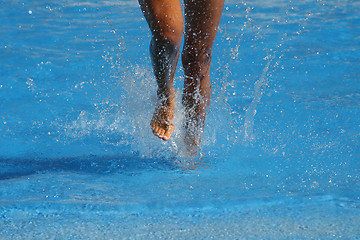 Image showing nice legs in water