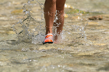 Image showing nice legs in water