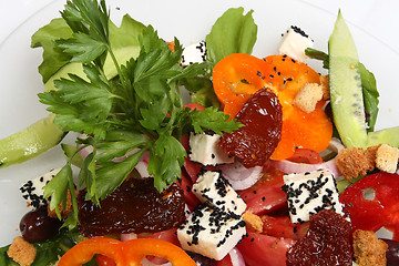 Image showing greek salad with tomato, cheese and olives