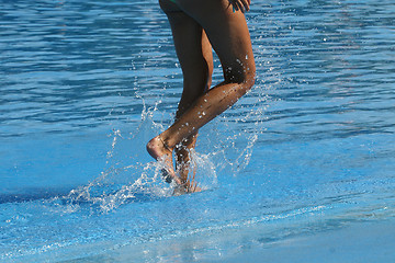 Image showing nice legs in water