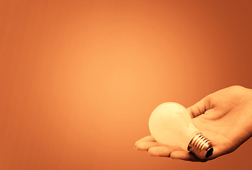 Image showing Background with lit lightbulb