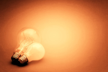 Image showing Background with lit lightbulb