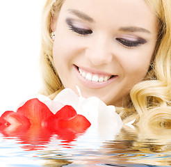 Image showing happy woman with lily flowers