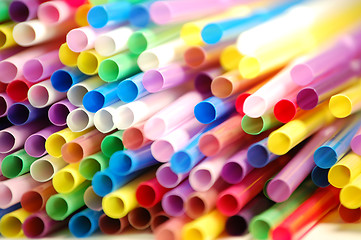 Image showing many color cocktail straws isolated on white