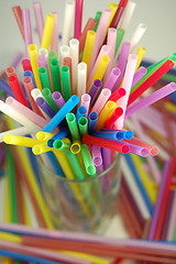 Image showing many color cocktail straws isolated on white