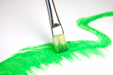 Image showing paintbrush and painted brush stroke isolated 