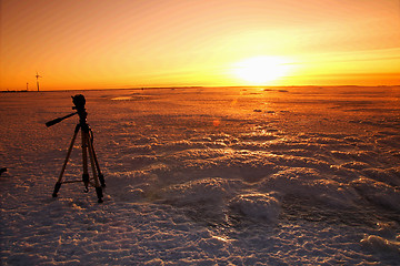 Image showing Sunset over frozen lake