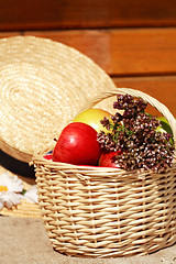 Image showing Basket with apples and herbs