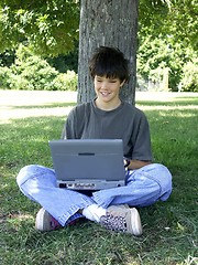 Image showing teen and laptop,smiling