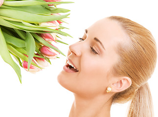 Image showing happy woman with flowers