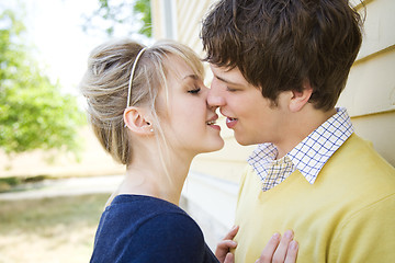 Image showing Young caucasian couple kissing