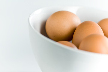 Image showing Brown Eggs in White Bowl