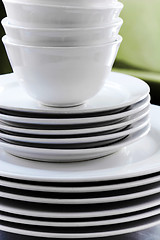 Image showing Stack of White Plates and Bowls