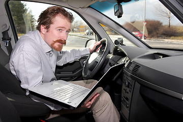 Image showing driver using gps laptop