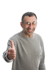 Image showing middle age man smiling thumbs up