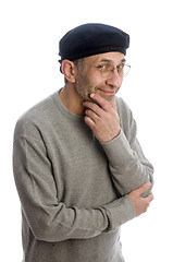 Image showing aging artist thinking with beret hat