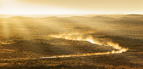 Image showing racing through the desert