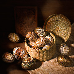 Image showing handmade brown romanian decorated easter egg still-life