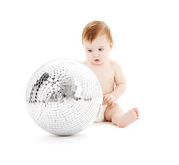 Image showing adorable baby boy with big disco ball