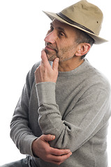 Image showing middle age man adventure hat thinking