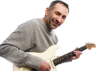 Image showing middle age man playing guitar musician