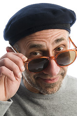 Image showing aging artist thinking distorted nose close up beret hat