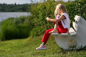 Image showing Girl on  bench