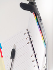 Image showing Office stationary - Pen and diary on white