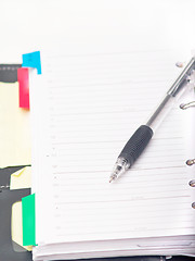 Image showing Office stationary - Pen and diary on white