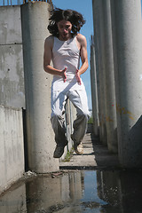 Image showing man levitation above water