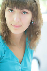 Image showing green-eyed girl in blue t-shirt