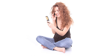 Image showing Pretty girl talking on the phone