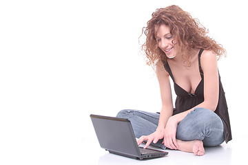 Image showing young woman using laptop