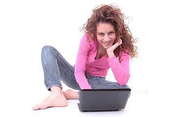 Image showing young woman using laptop