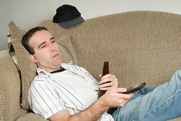 Image showing Male With Beer Watching TV