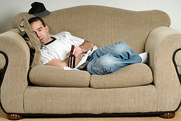 Image showing Sleeping With Beer