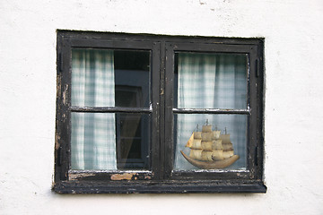 Image showing boat awaits in  the window